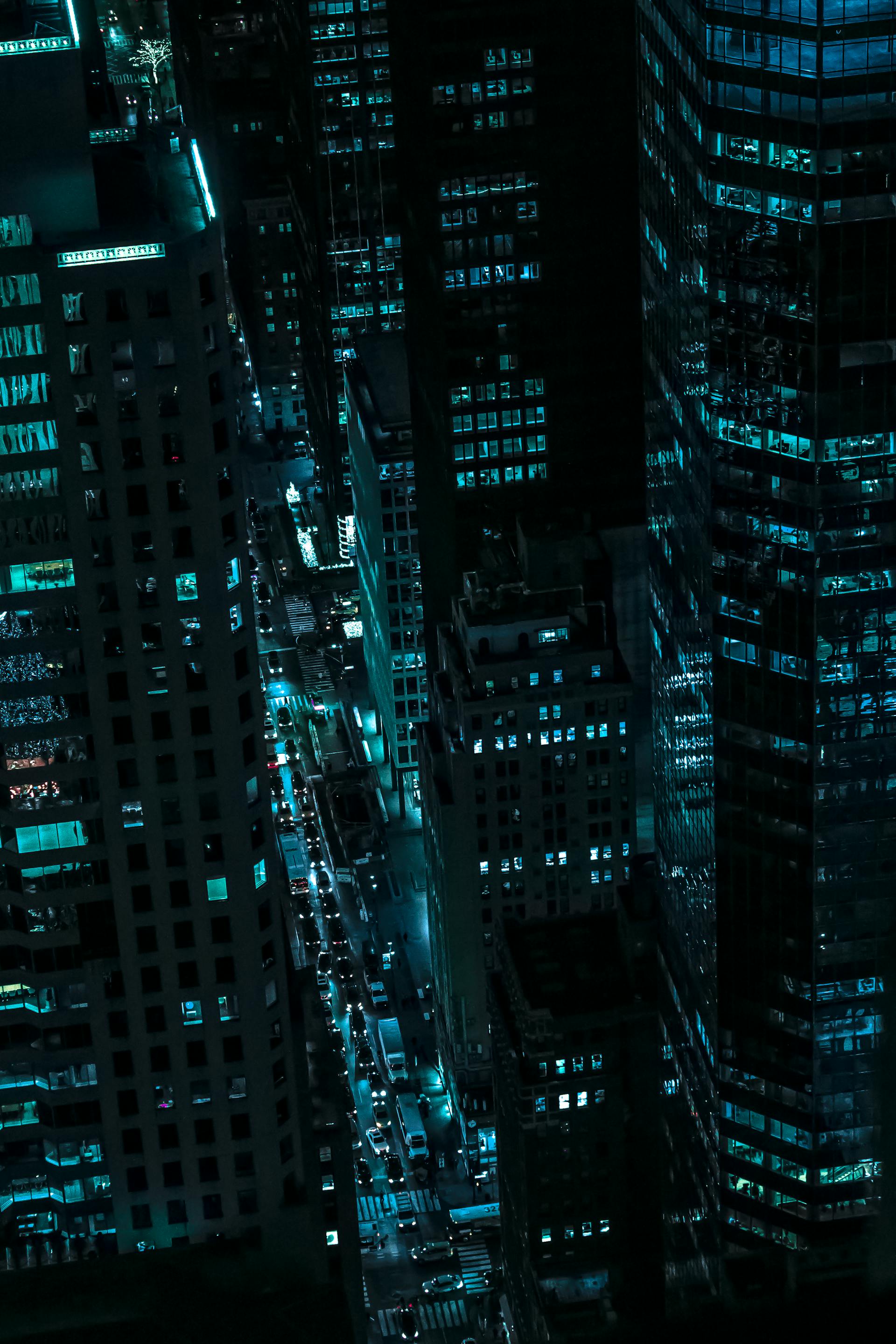 Dark cityscape with teal lights — modern procurement intelligence